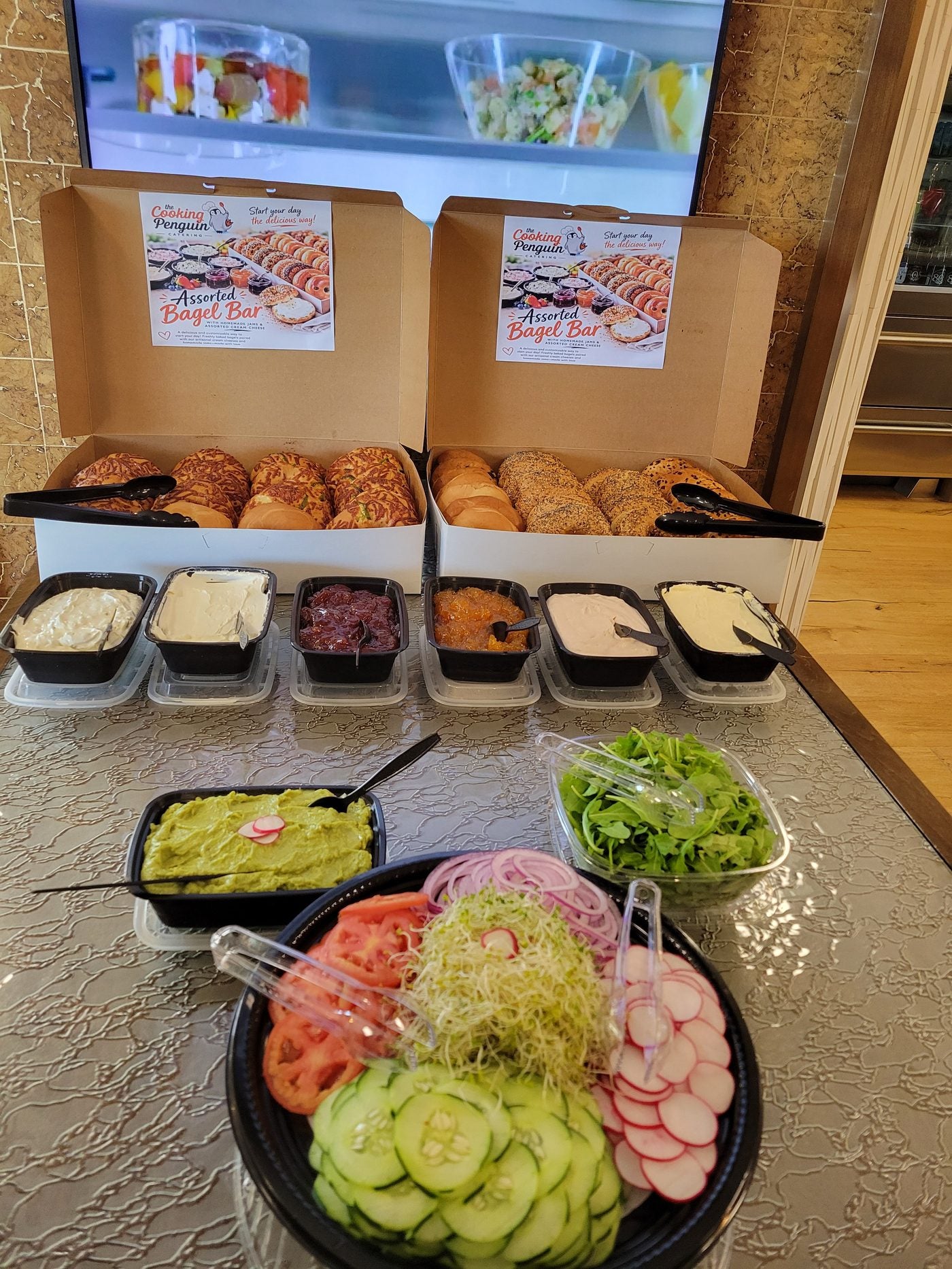 Assorted bagel bar with homemade cream cheeses and jams